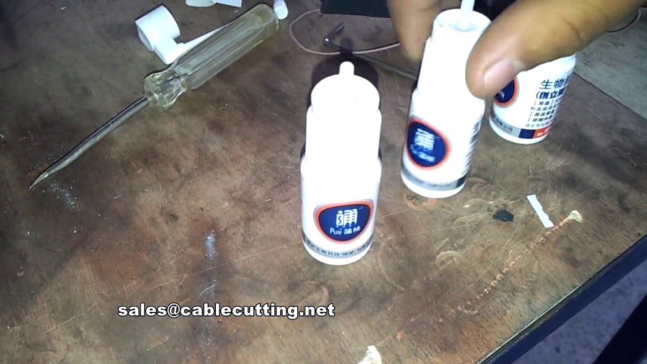 Ujian Label Transparan: Mesin Pelabel Botol AL 50D dengan Pencetak Kod
